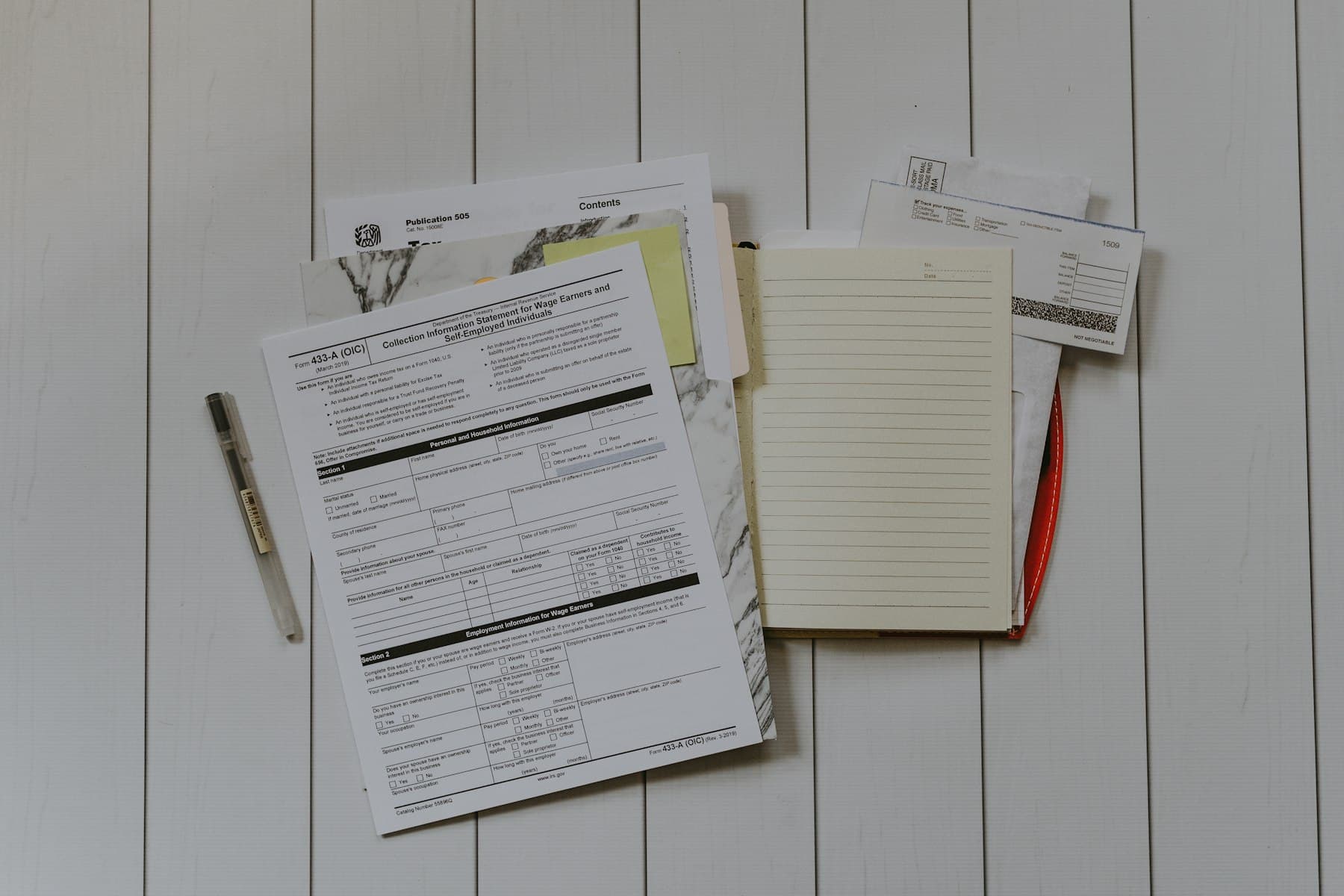Financial forms organized on a desk