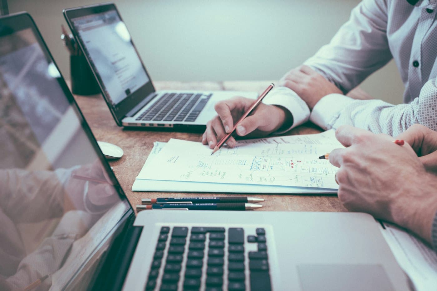 Business documents and charts prepared for review